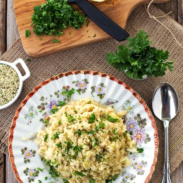 Cauliflower Risotto in a plate with a spoon on the side