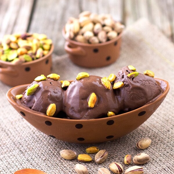 Homemade Dark Chocolate Ice Cream served in a bowl garnished with pistachios