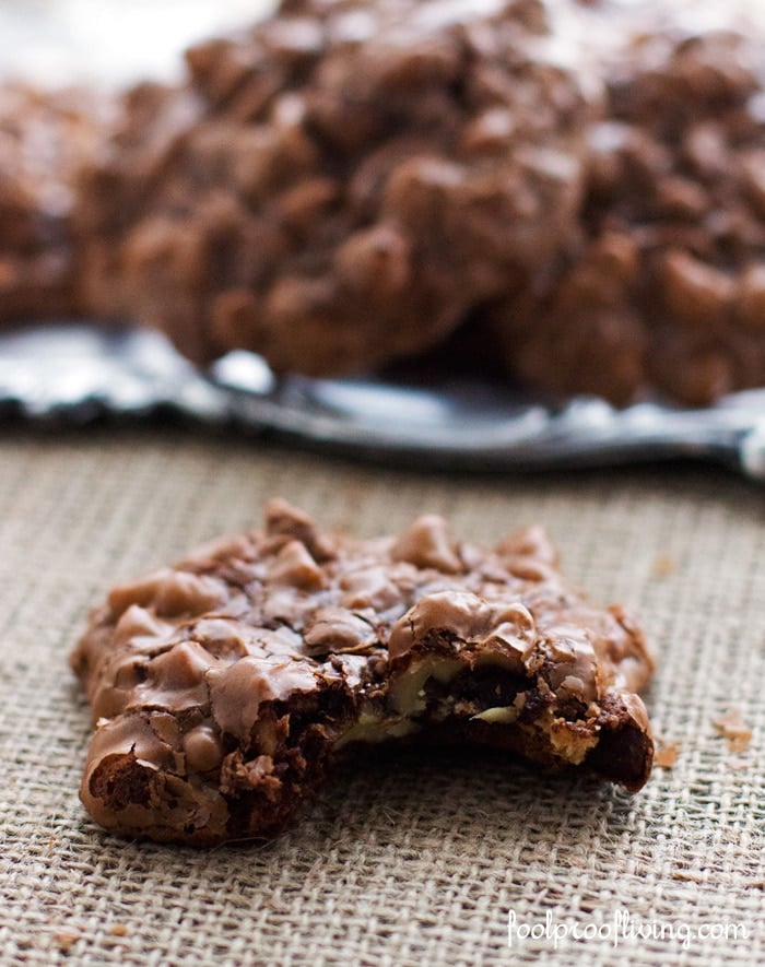 One Peanut Butter Globs cookie half eaten photographed close up.