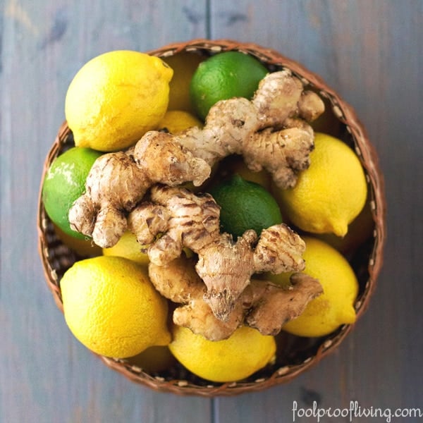 Ingredients for ginger ice tea - lemon, lime, and fresh ginger