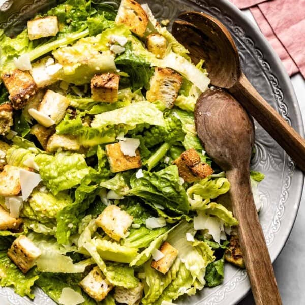 Classic Caesar salad in a bowl from the top view
