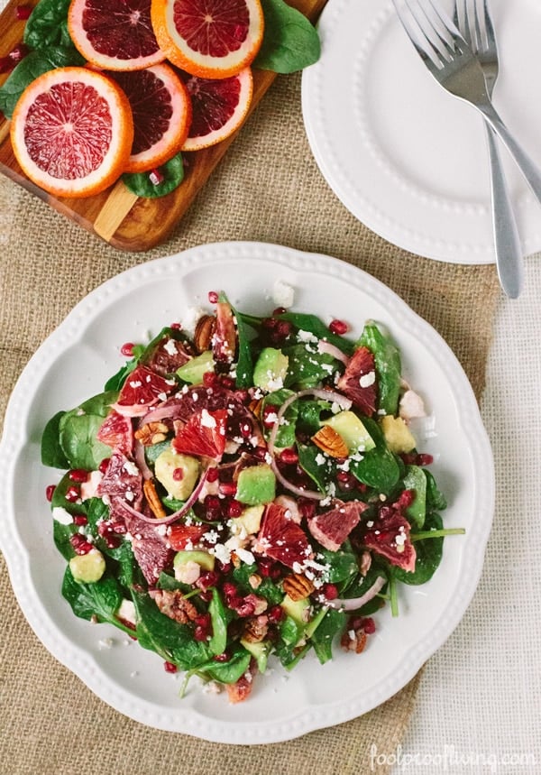 Baby Spinach Salad with Blood Oranges on a plate