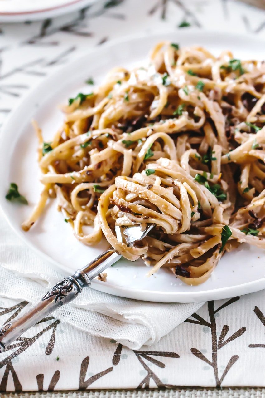 Close up of Linguine with Walnut Bachamel Sauce and Sun-Dried Tomatoes