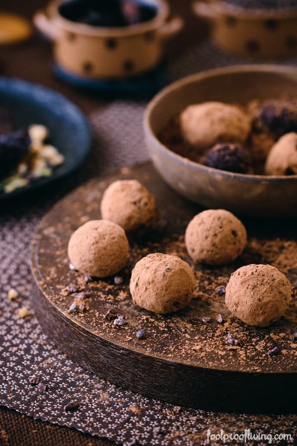 Prep for Cocoa Truffles on a round platter with chocolate chips cocoa powder