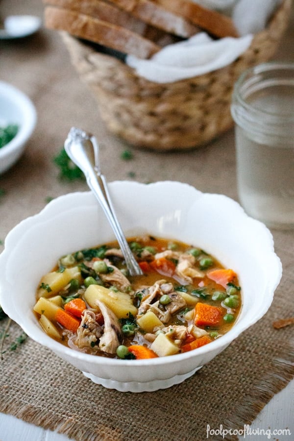 A bowl of Chicken Stew with a spoon