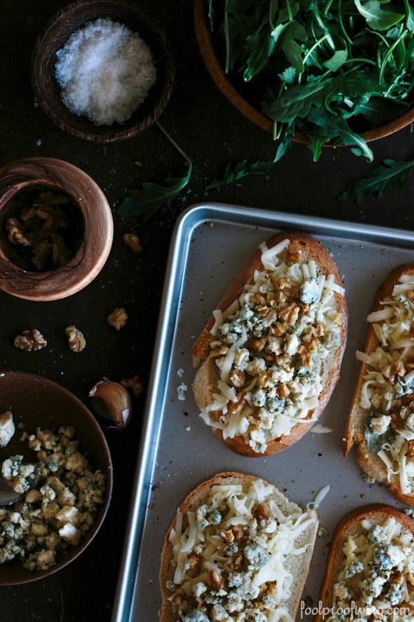 Four sliced of Bruschetta with Truffle Oil on a sheet pan