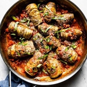 eggplant involtini in a skillet from the top view