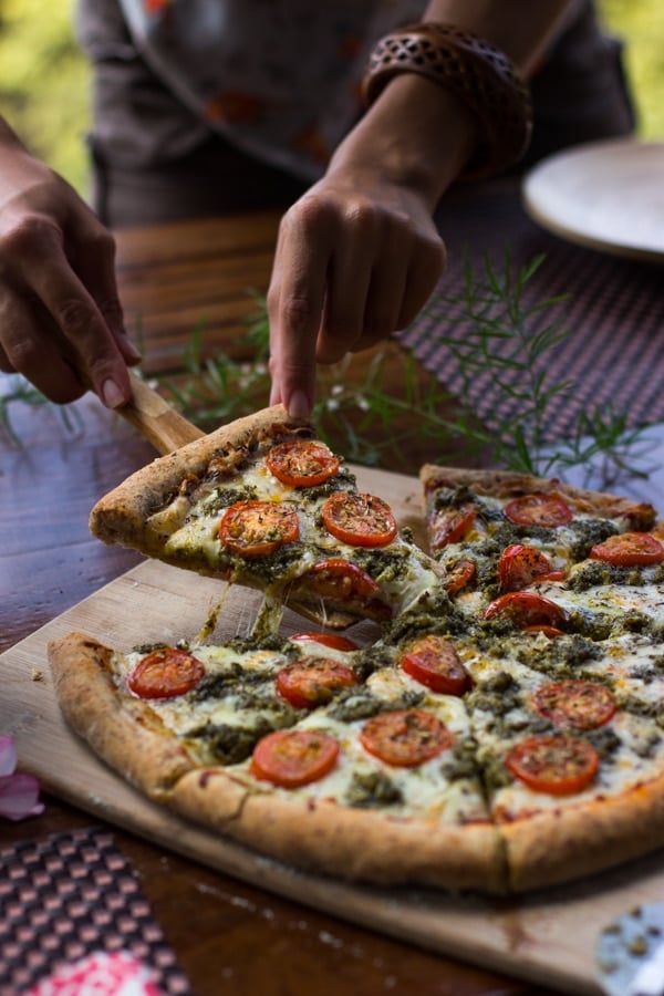 Whole Wheat Pizza Crust with one slice being remove.