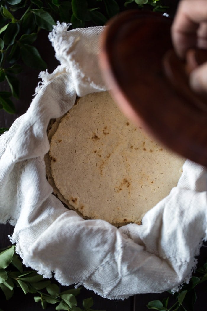 Cooked corn tortillas in a basket -  Learn how to make corn tortillas