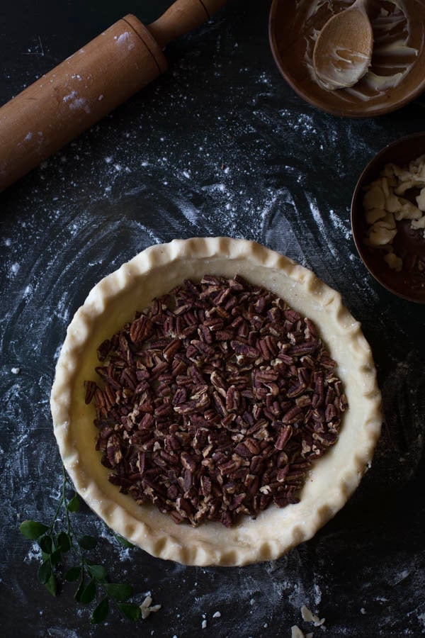 Top view of crust for Old-Fashioned Maple Pecan Pie with Bourbon Whipped Cream