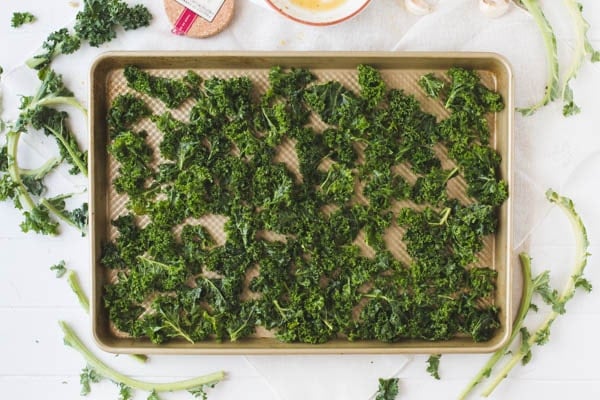 Kale arranged on a sheet pan