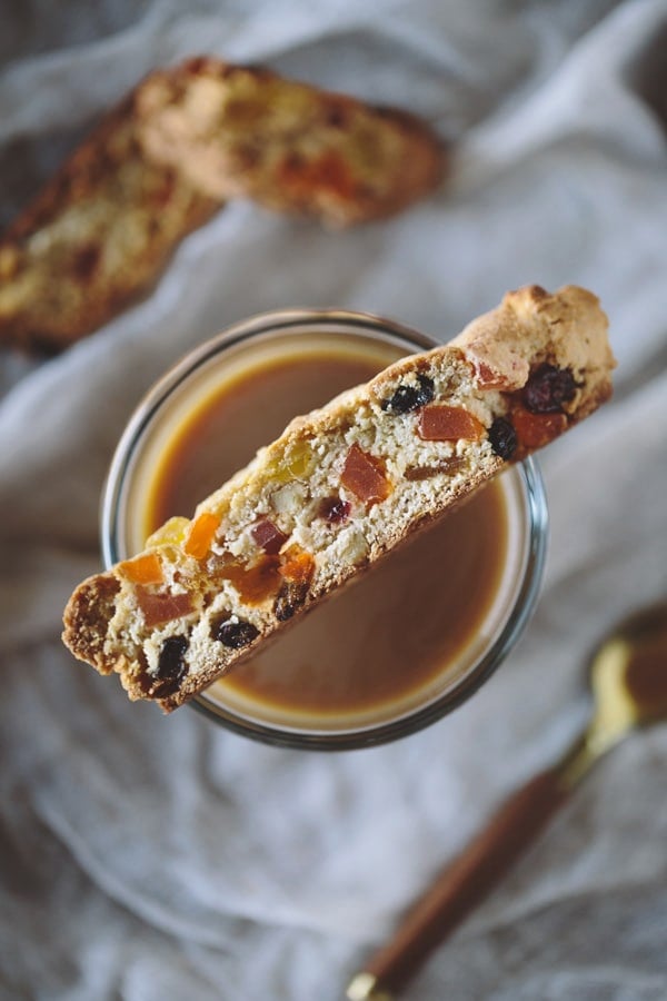 Caribbean Biscotti resting on a glass of hot beverage