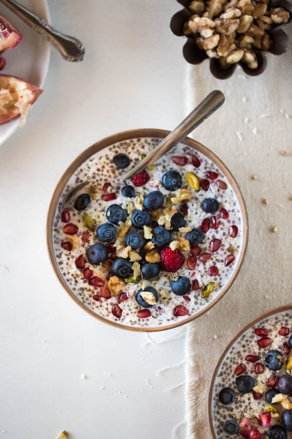 a bowl of buckwheat overnight oats placed in a bowl with fruits