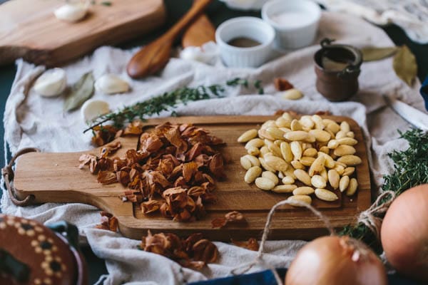 Blanched almonds on a cutting board