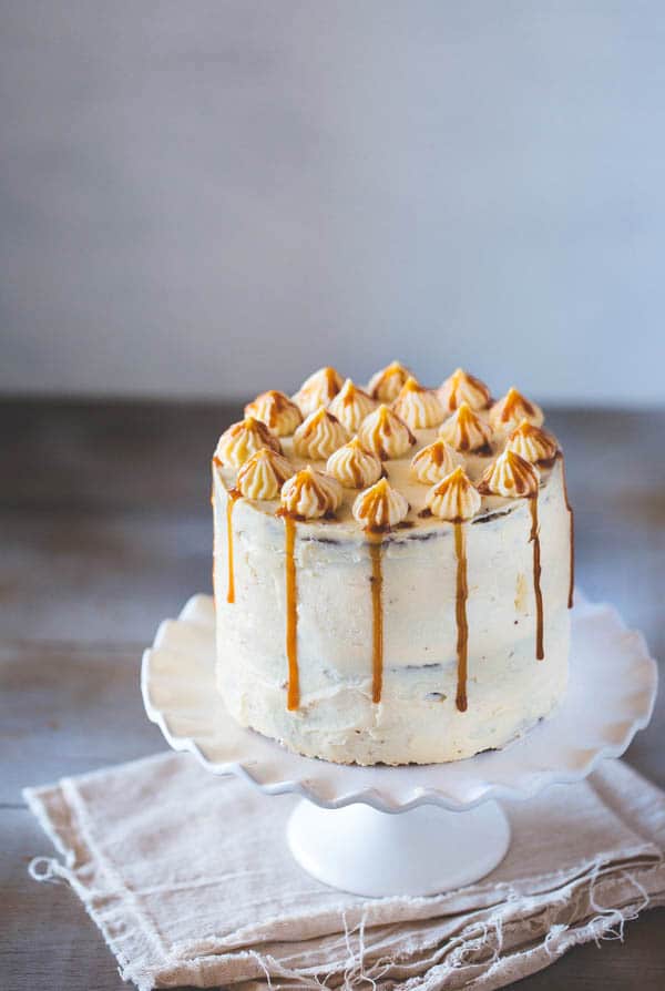 A 6 inch layered Banana Cake on a cake stand