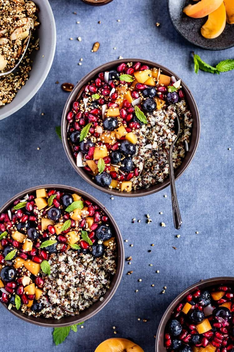 Quinoa Breakfast Cereal Recipe served in bowls and topped off with fruit