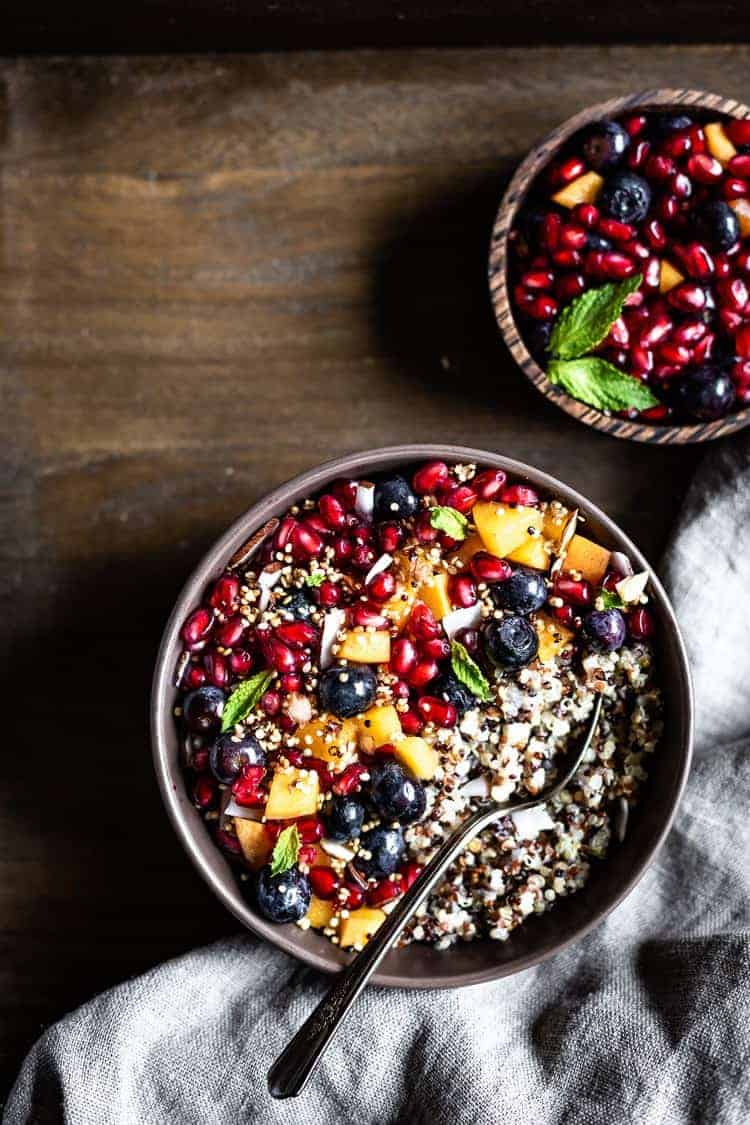 Quinoa Breakfast Porridge topped off with fruits and granola