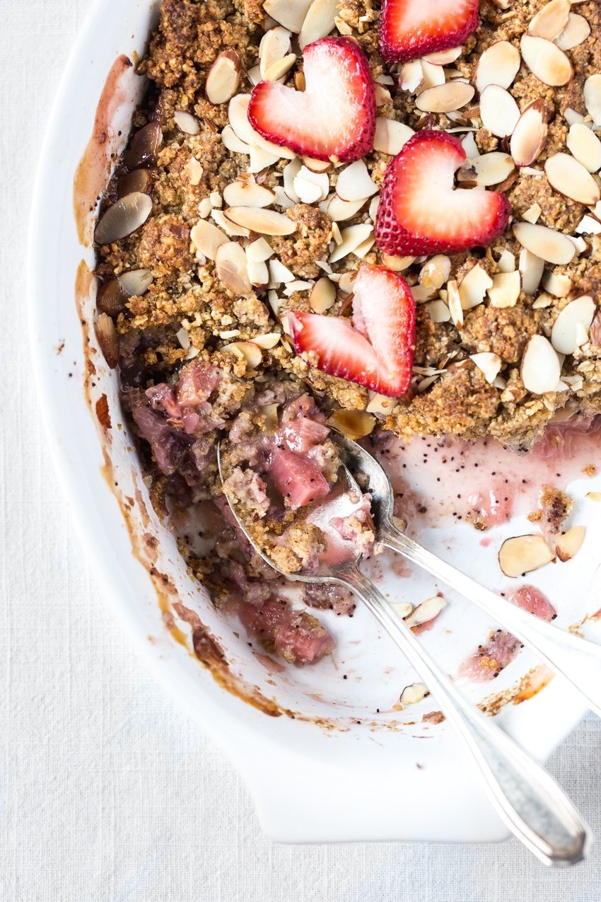 Strawberry Rhubarb Breakfast Crisp recipe topped off with strawberries
