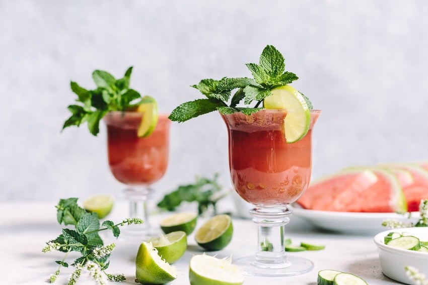 2 cups of Minty Watermelon Cucumber Smoothie garnished with mint