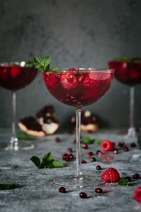 A glass of Raspberry Rose cocktail from the front view