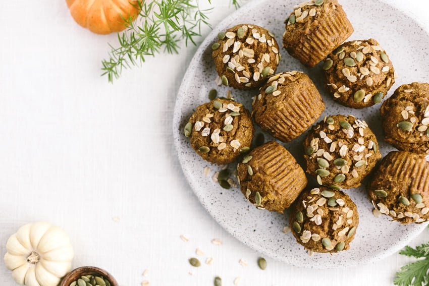 Maple-Sweetened Pumpkin Oat Muffins Recipe - A healthier pumpkin muffin recipe made with whole wheat flour and rolled oats and sweetened only with maple syrup.
