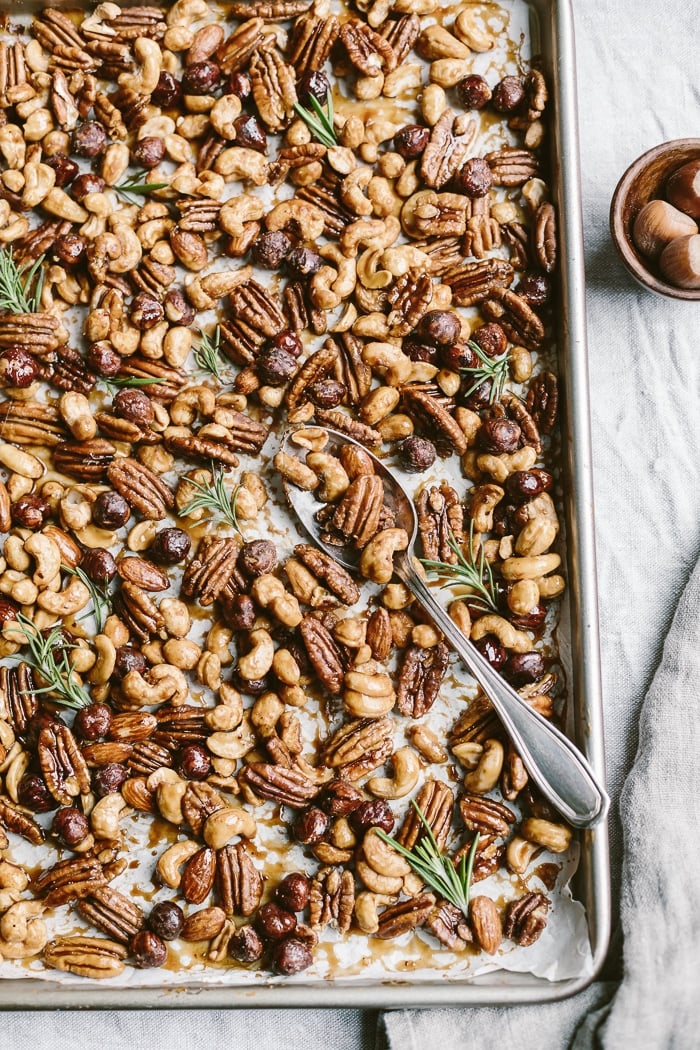 Overhead view of Spicy Candied Nuts on a sheet pan