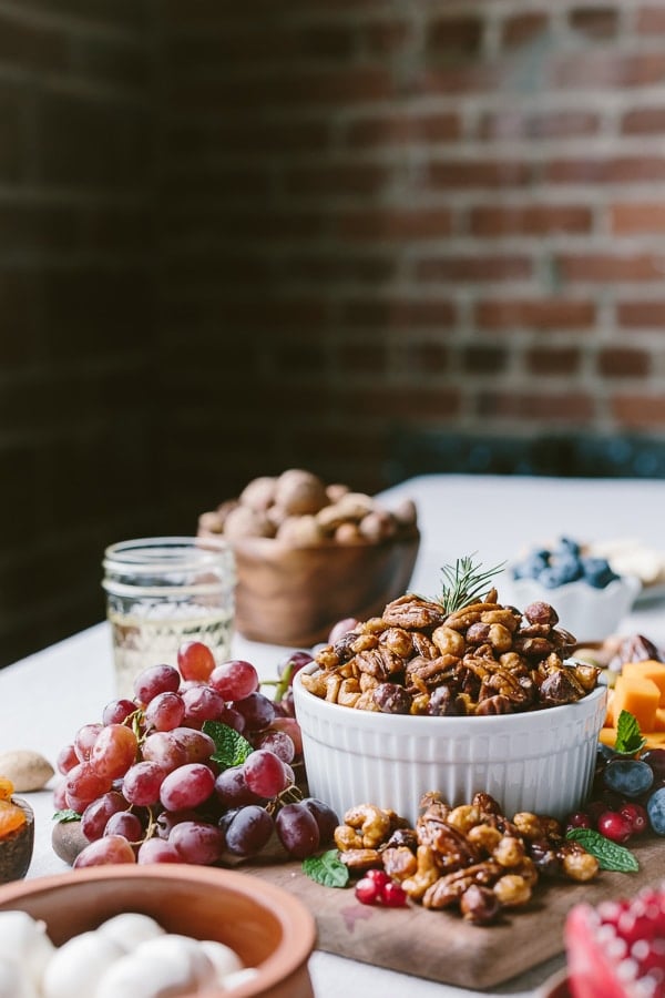 Close up view of Spicy Candied Nuts and grapes