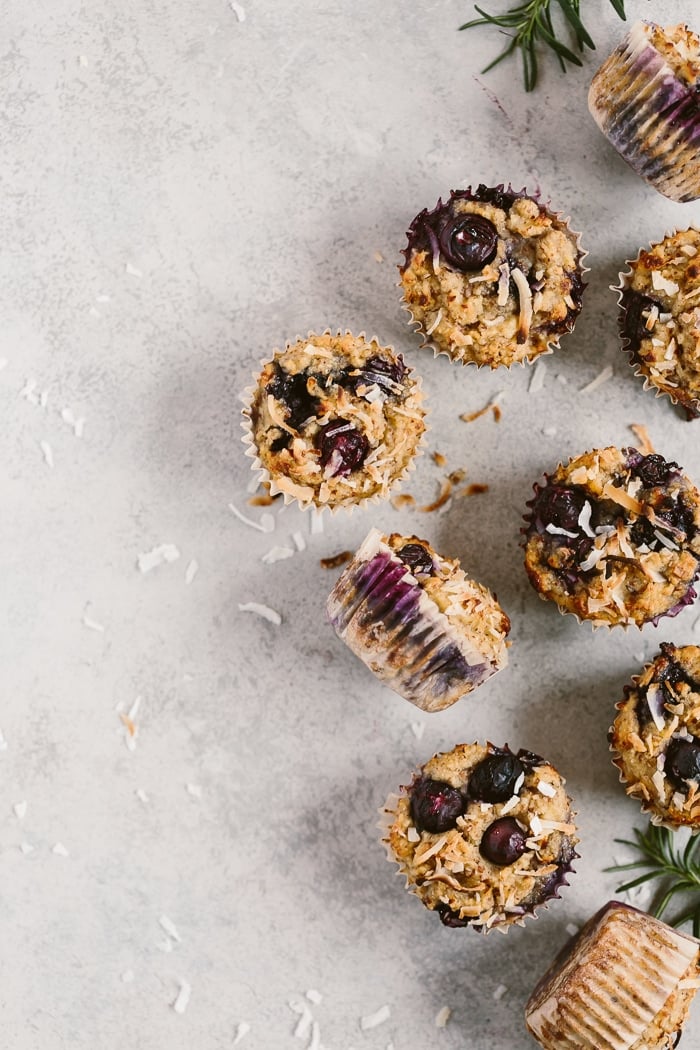 Flourless Blueberry Muffins placed on a light backdrop