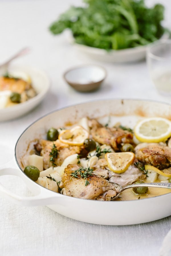 Chicken with olives and lemon in a large pot