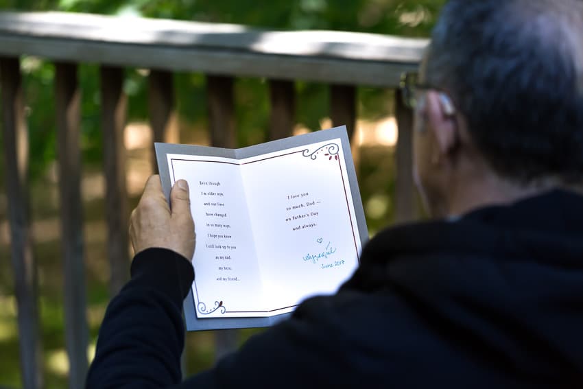 a man is reading a card