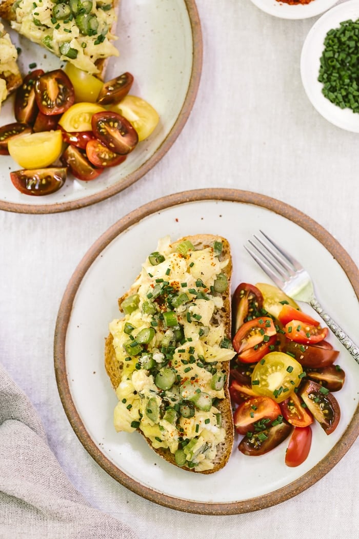 Truffled Asparagus Eggs on Toast Recipe: A quick and easy open-face sandwich recipe made with asparagus sautéed with truffle oil and mixed with eggs and goat cheese.