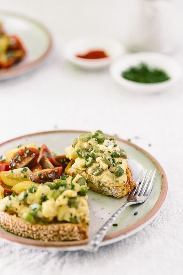 Truffled Asparagus Eggs on Toast Recipe: A quick and easy open-face sandwich recipe made with asparagus sautéed with truffle oil and mixed with eggs and goat cheese.