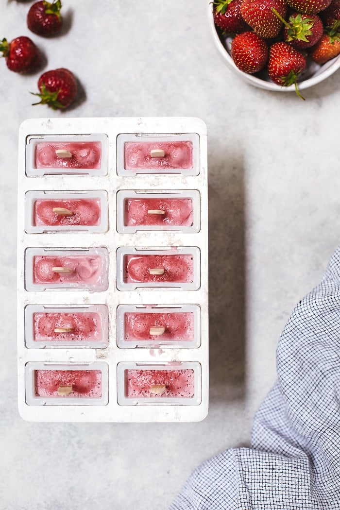 Coconut Cream popsicles with strawberry in the mold