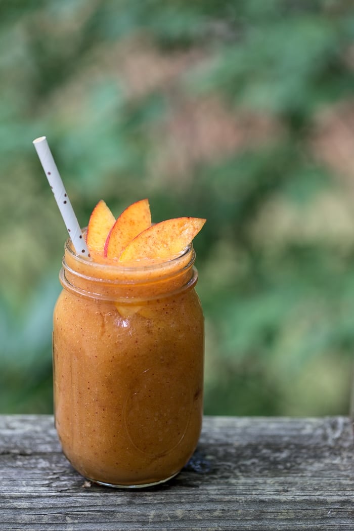 A vegan and banana-free Peach Mango Smoothie recipe.