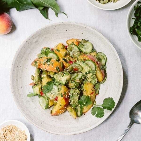Fresh Peach Avocado Salad: A vegan salad recipe made with fresh peaches, avocados, and cucumbers. Super flavorful and refreshing.