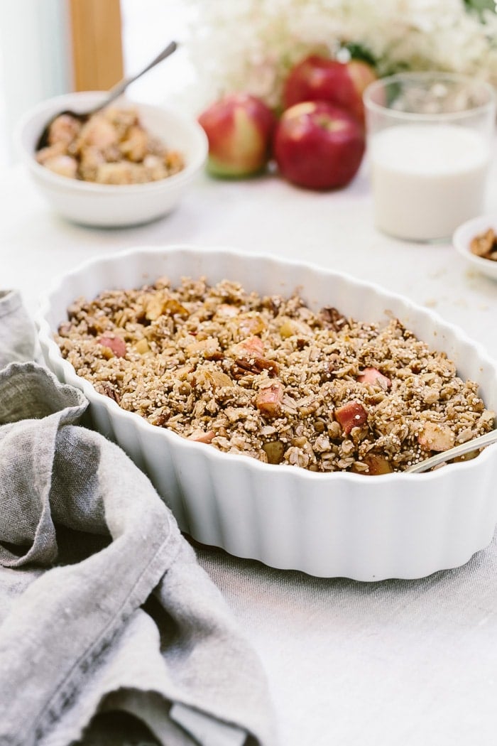 A healthier apple crumble recipe made with oats, quinoa, maple syrup and coconut oil.