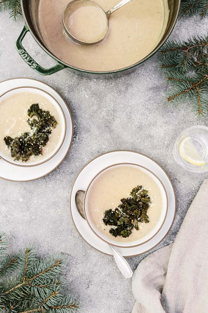 Sunchoke Soup recipe - Cooking Sunchokes - 2 bowls of sunchokes shown from the top view with lemon water on the side