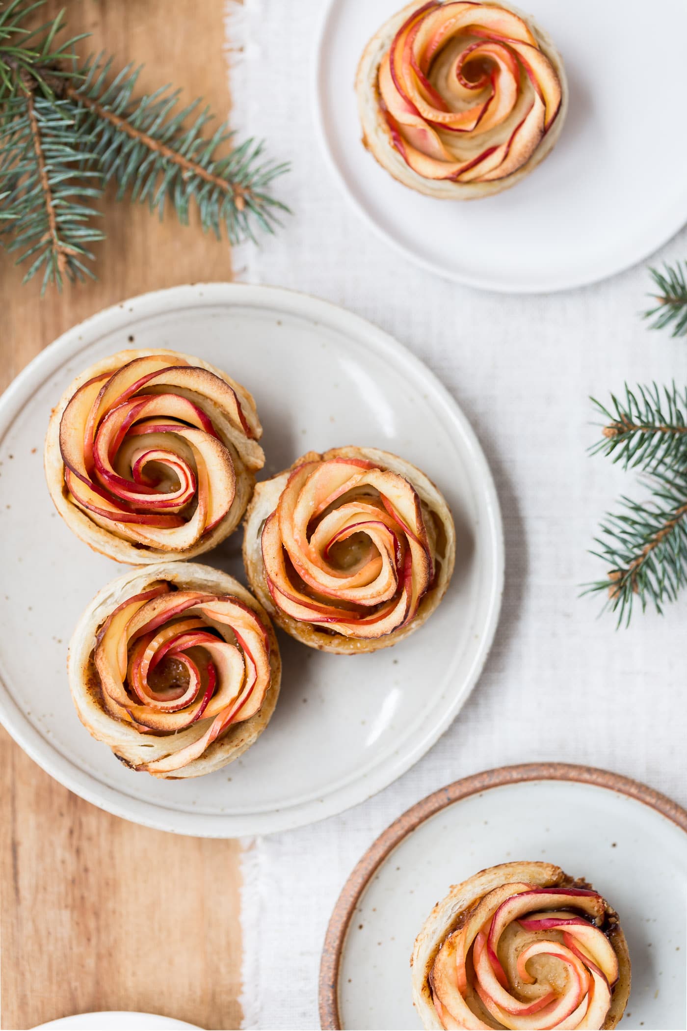 How to Make Apple Roses - Showcasing 3 finished apple roses from the top view.