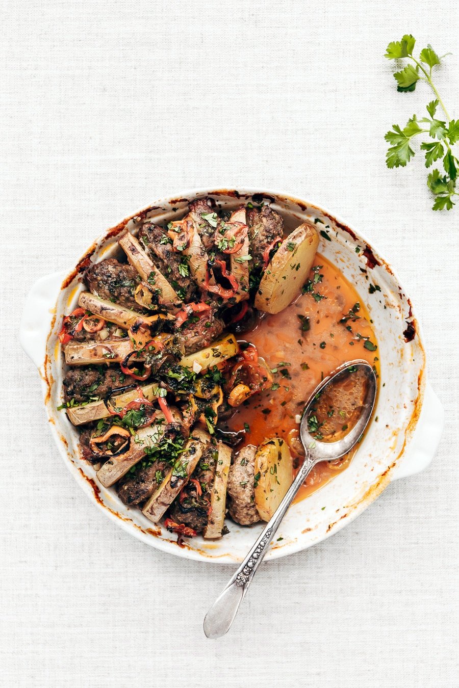 A half eaten Turkish Meatball Potato Bake is photographed from the