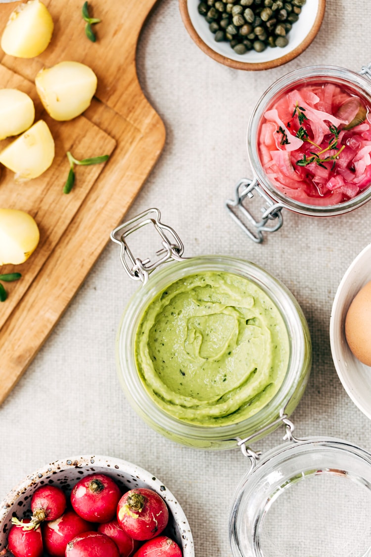 This creamy Deviled Egg Salad is made with green avocado dressing (pictured here) and is a healthier version of the creamy potato and egg salad we all love.
