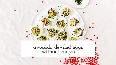 A plate filled with deviled eggs with mayo are photographed from the top view.