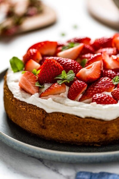 Almond Flour Strawberry Cake garnished with mint