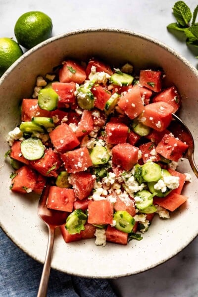 Watermelon cucumber salad in a bowl from the top view.