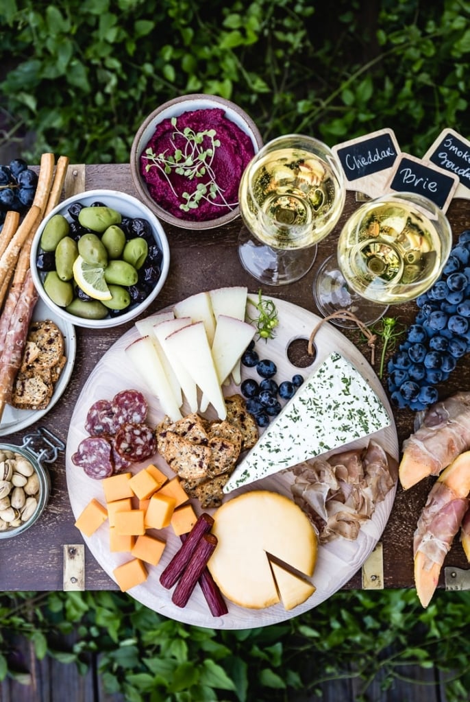 Meat and Cheese Platter (Charcuterie Board) served with wine on the side