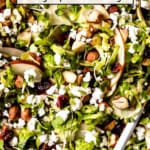 shredded brussel sprouts salad recipe from close up with text on the image