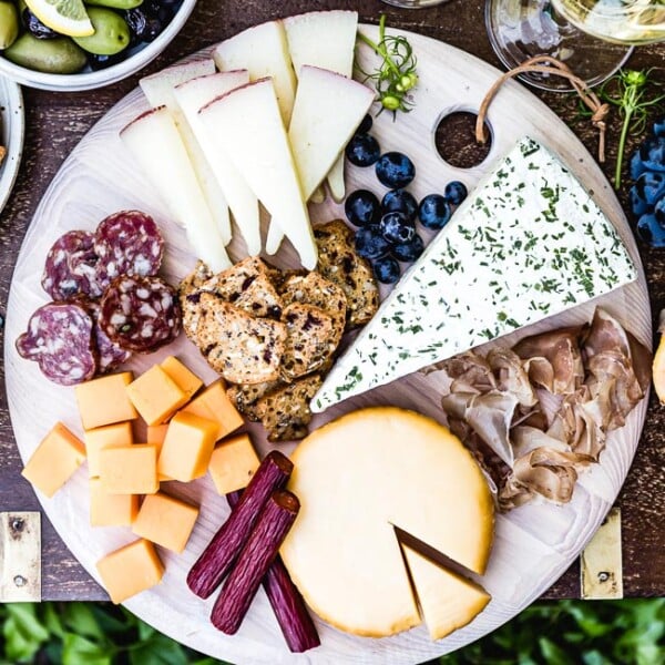 Meat and Cheese Platter (Charcuterie Board) served with wine on the side