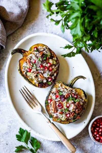 Vegan Stuffed Acorn Squash recipe placed on a plate and photographed from the top view