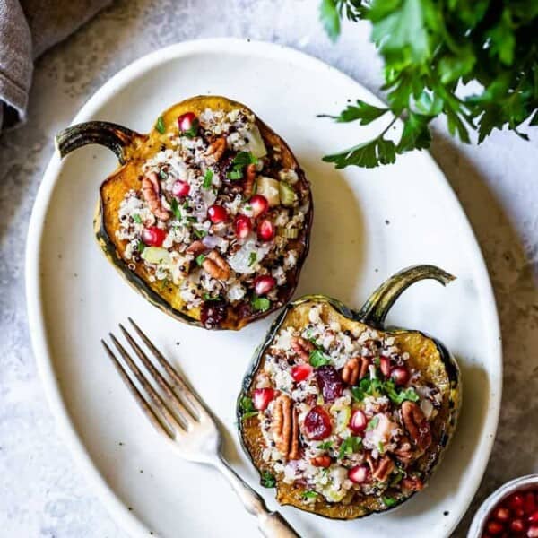 Vegan Stuffed Acorn Squash recipe placed on a plate and photographed from the top view
