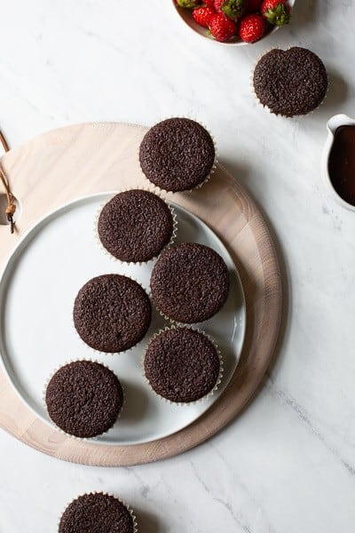 moist gluten free chocolate cupcakes on a plate