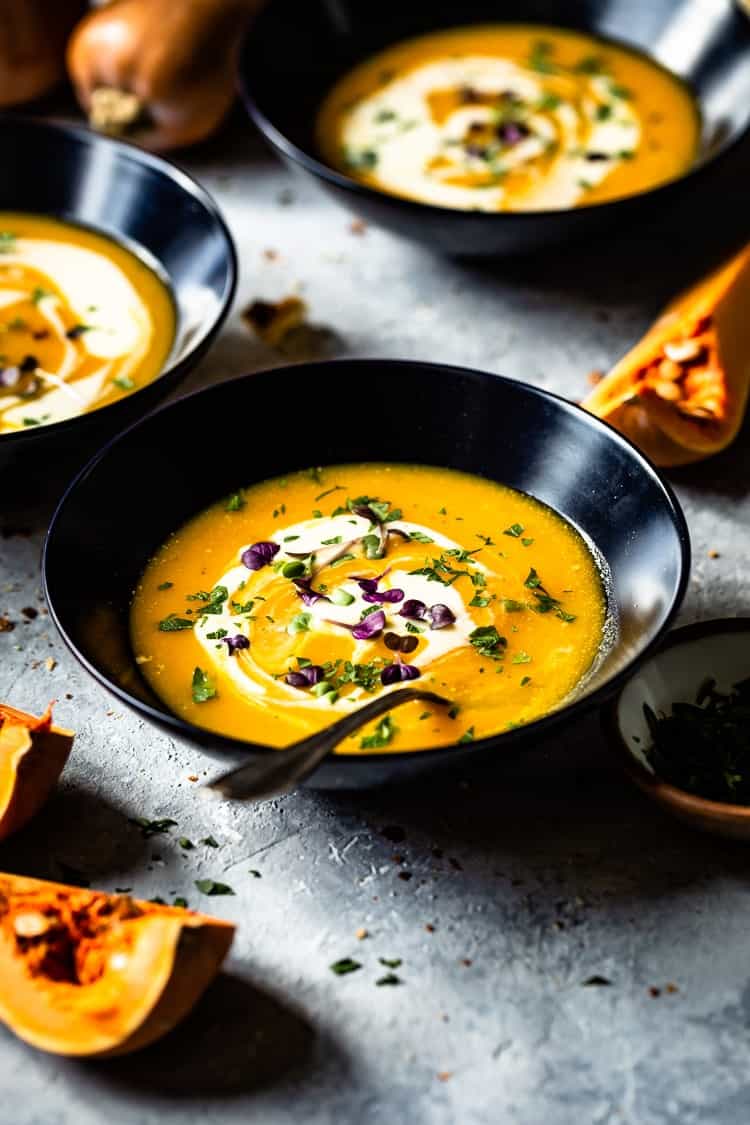 Vegetarian Butternut Squash soup in a bowl with a spoon